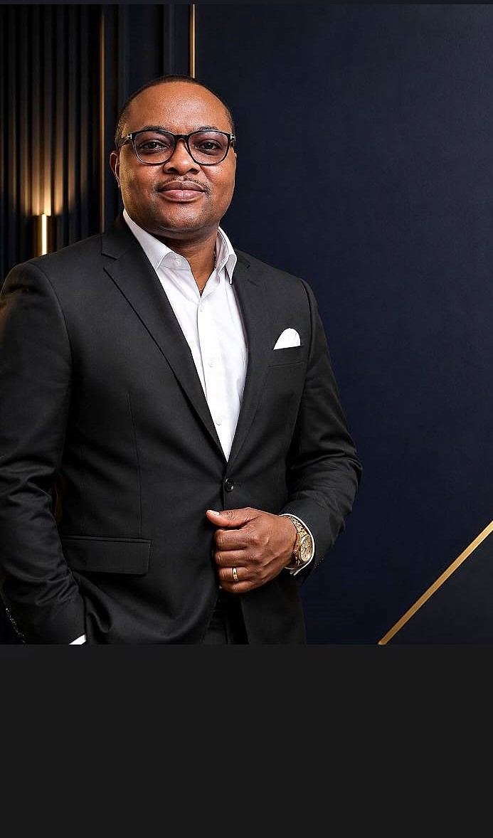 Professional portrait representing Prince S. Eric John, founder of AI Profit Advantage